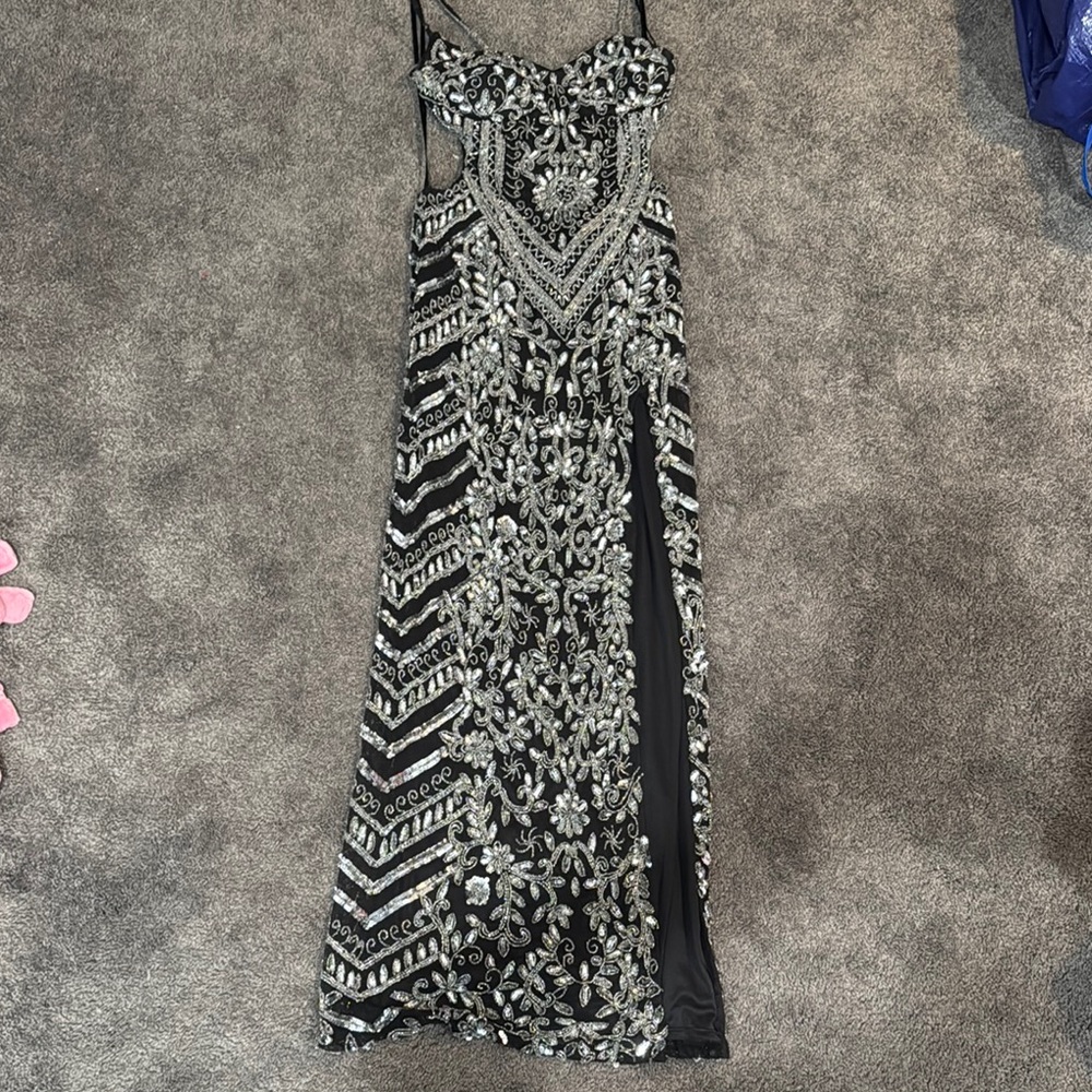 Elegant Black and Silver Embellished Dress with Slit and Open Back